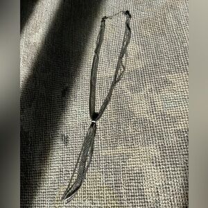 Multi-chain silver tassle necklace